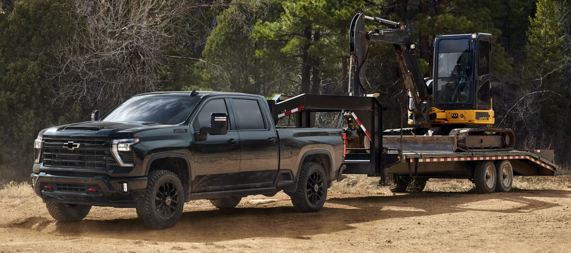 chevy truck towing construction equipment